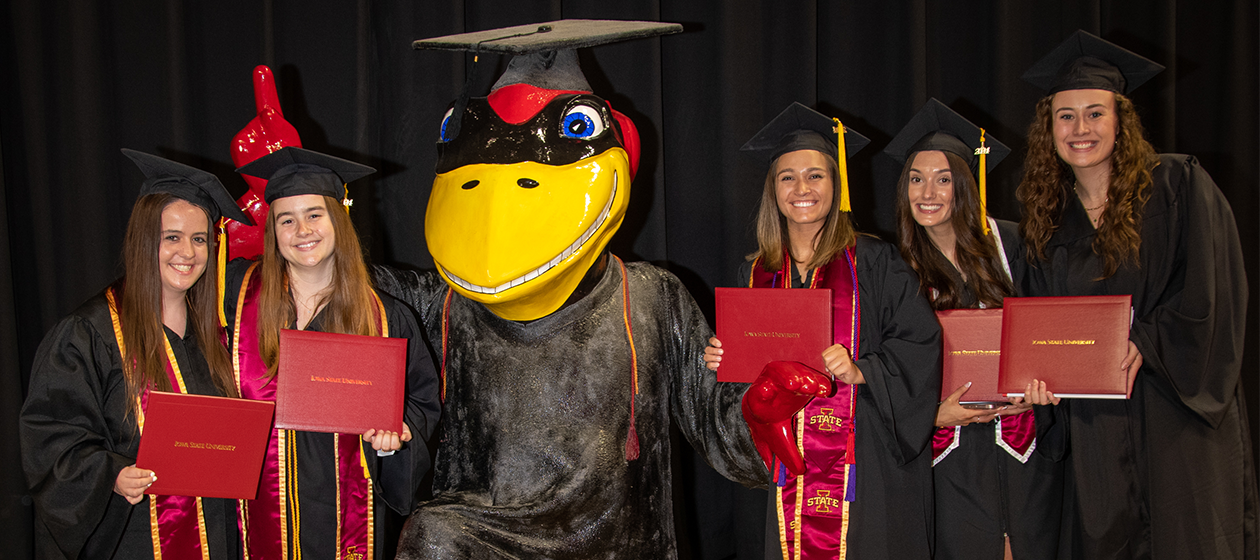 Graduates with Cy