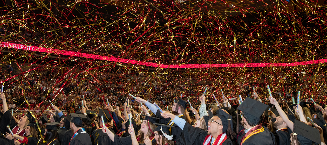 Graduates throw streamers