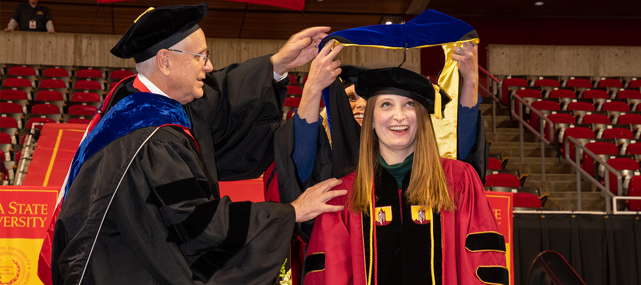 Receiving Doctoral Hood